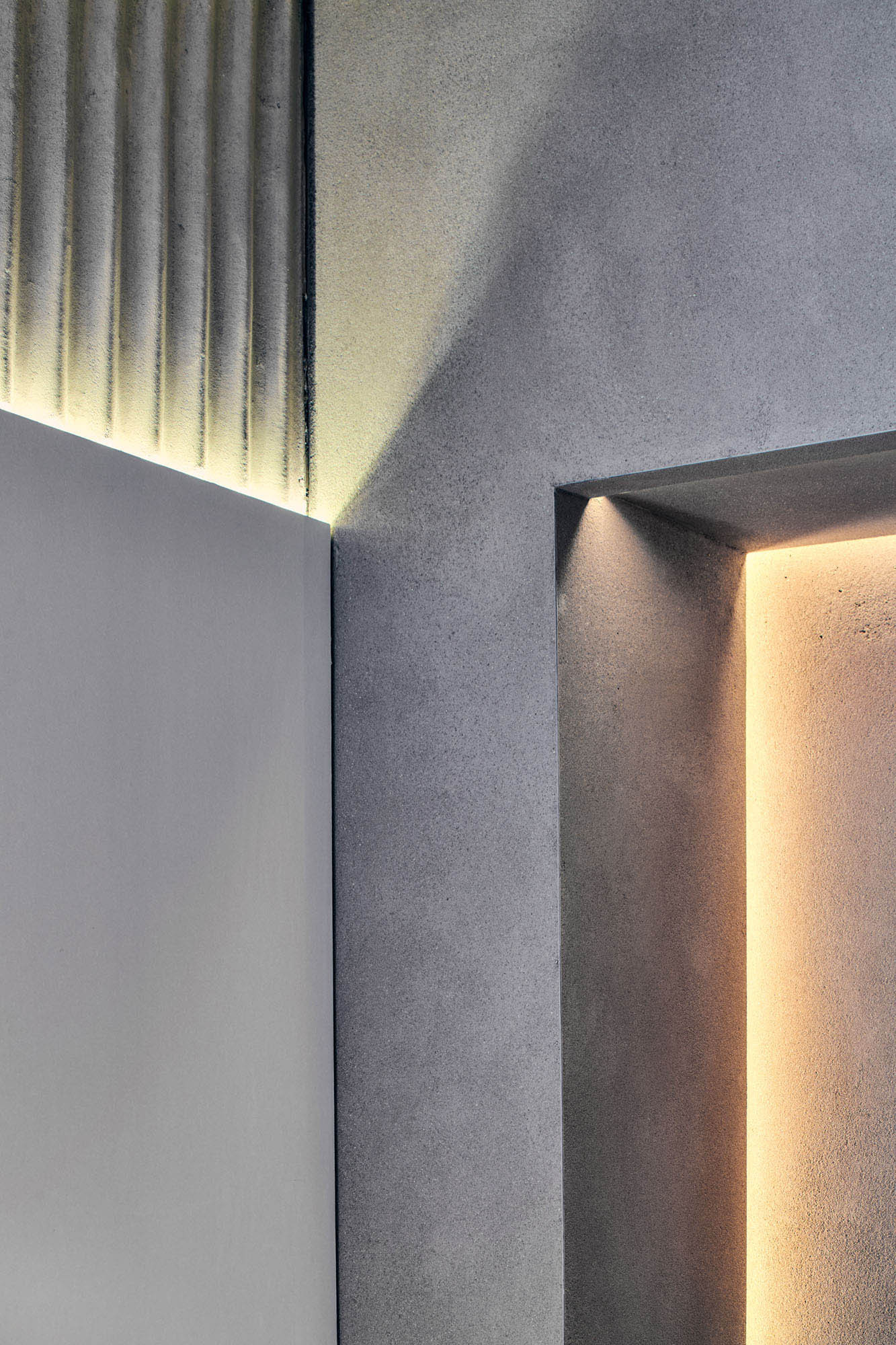 Natural textures and performance materials in the Seven Layer store fit-out — retail interior architecture by BusbyWebb