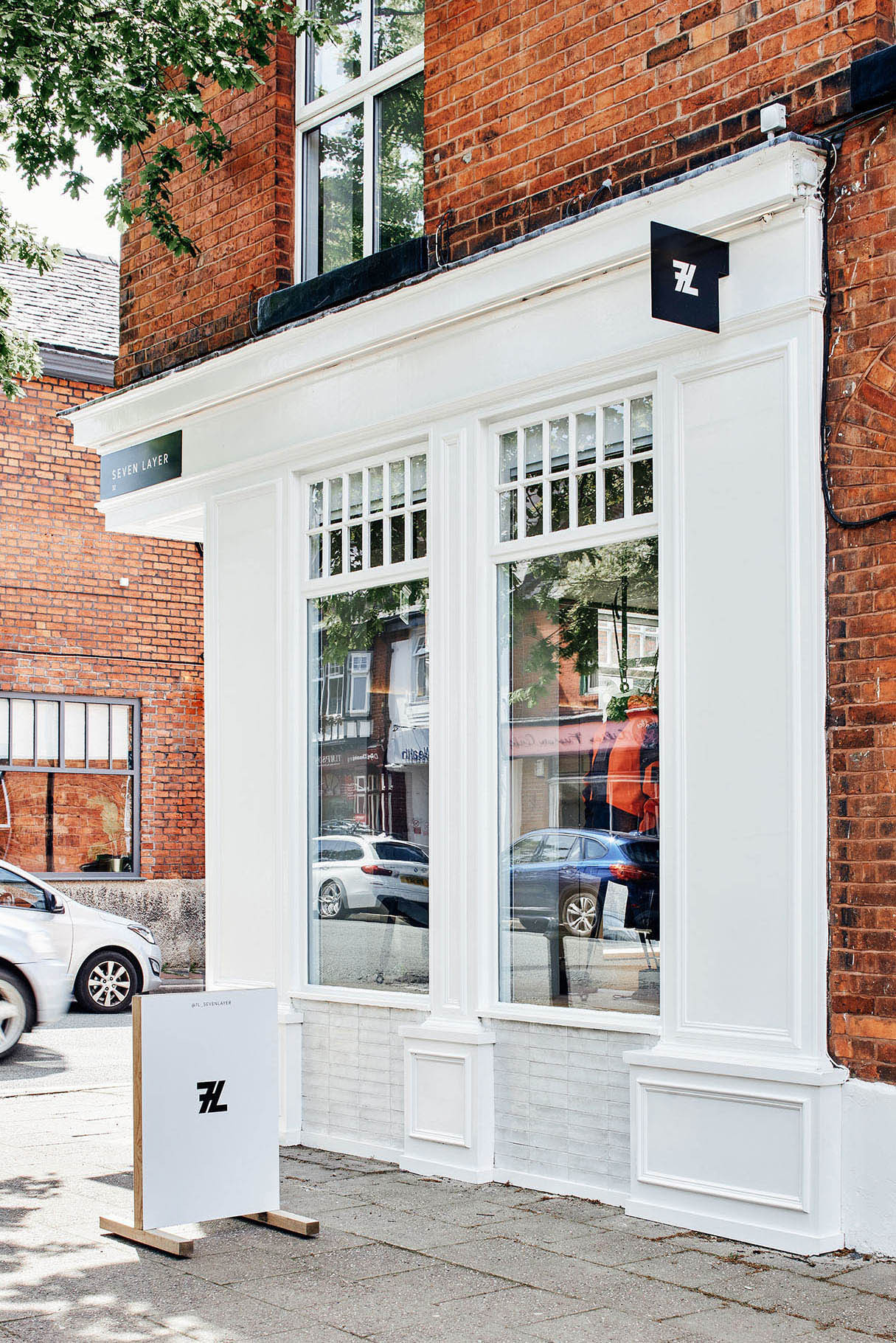 Seven Layer flagship store exterior with A board by BusbyWebb