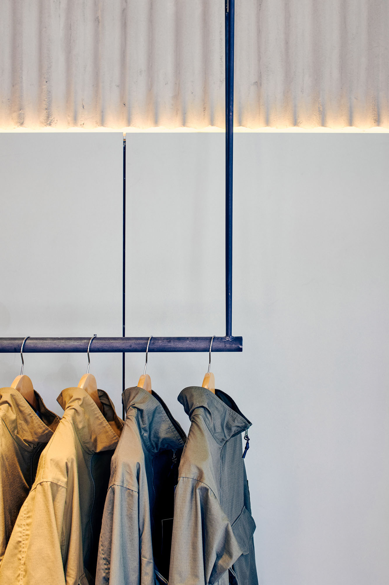 Seven Layer menswear retail rail design by BusbyWebb