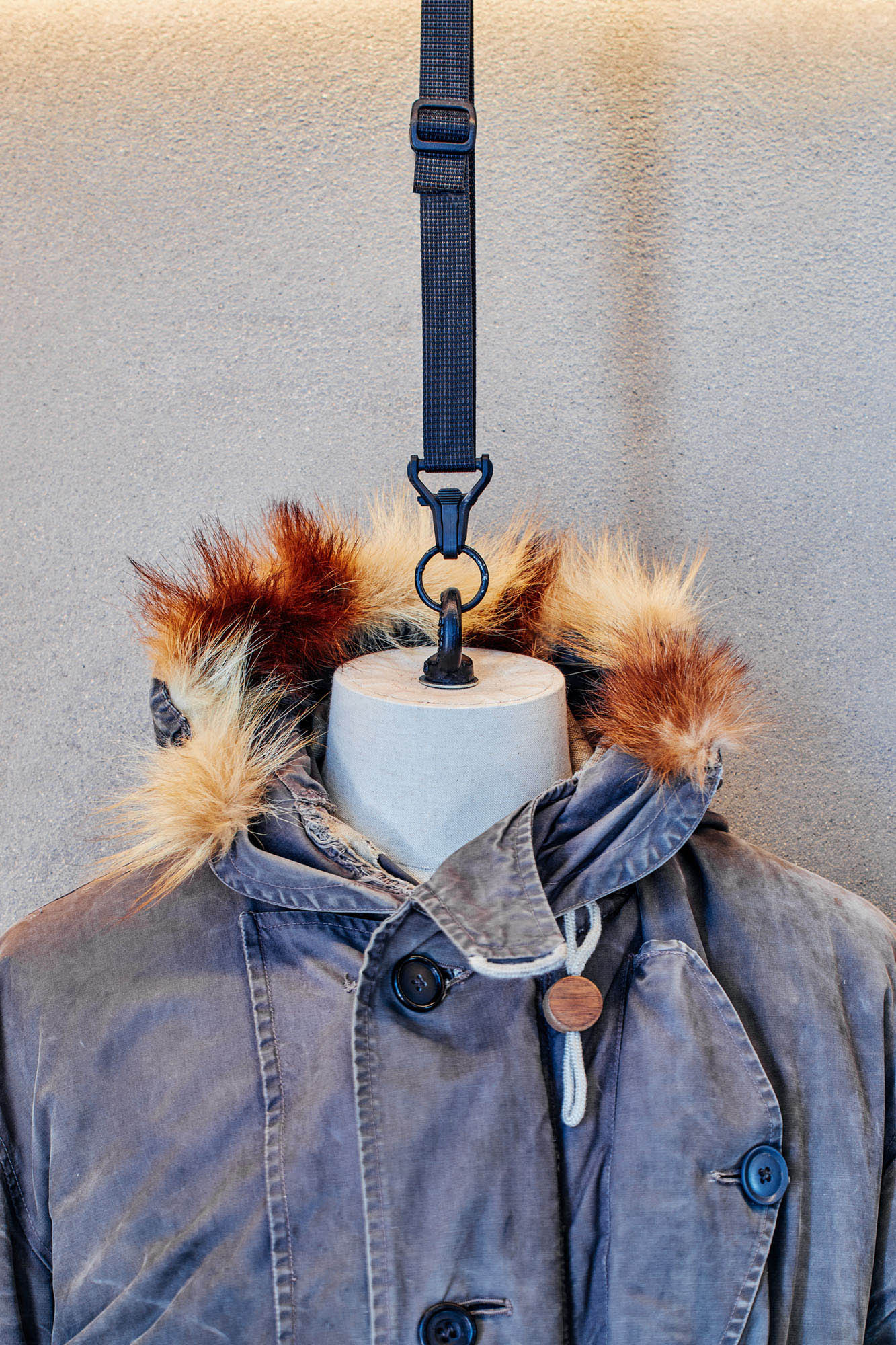 performance clothing military display system in Seven Layer menswear store by BusbyWebb