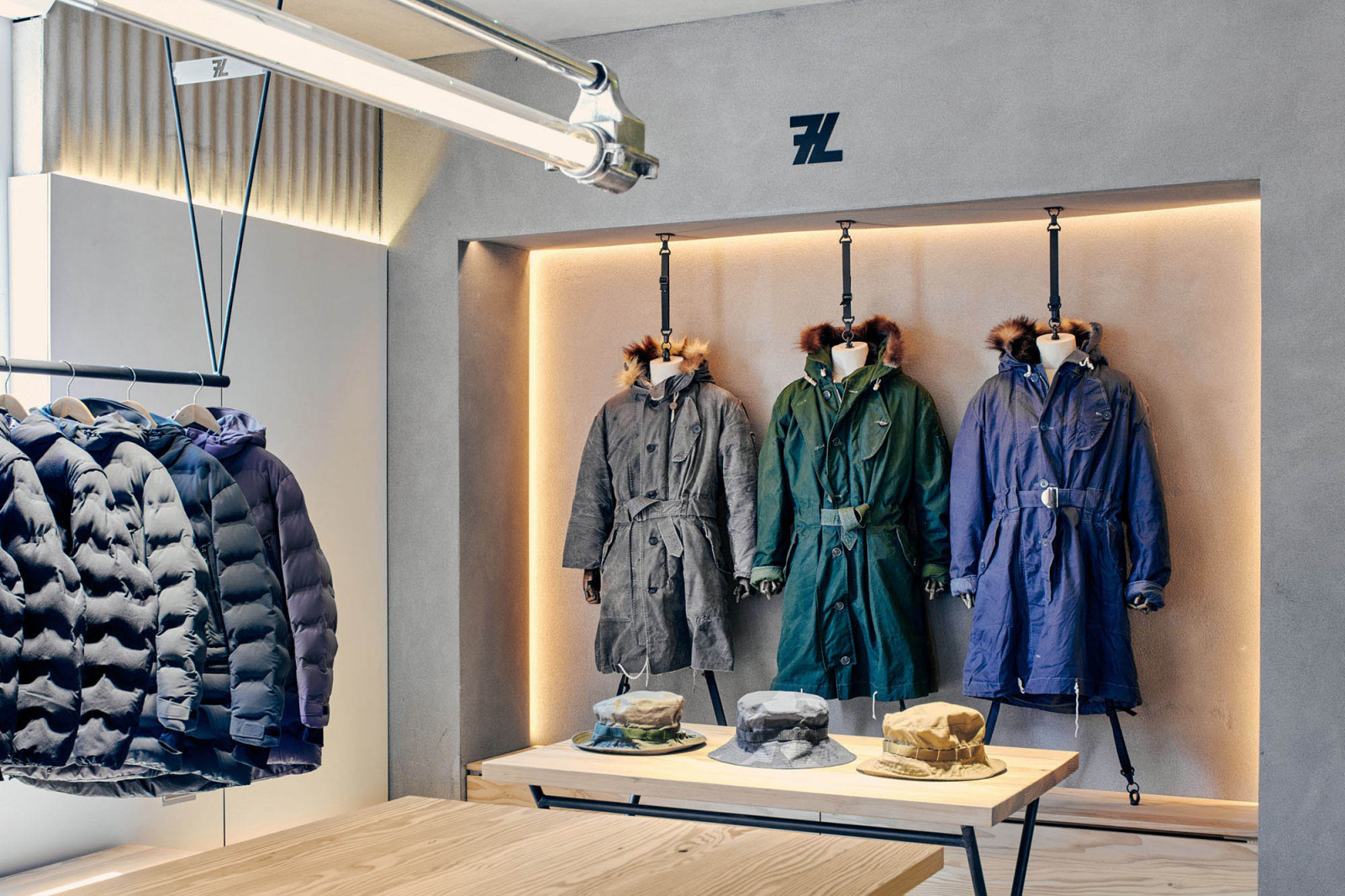 clothing display system in Seven Layer menswear store, Alderley Edge, design by BusbyWebb