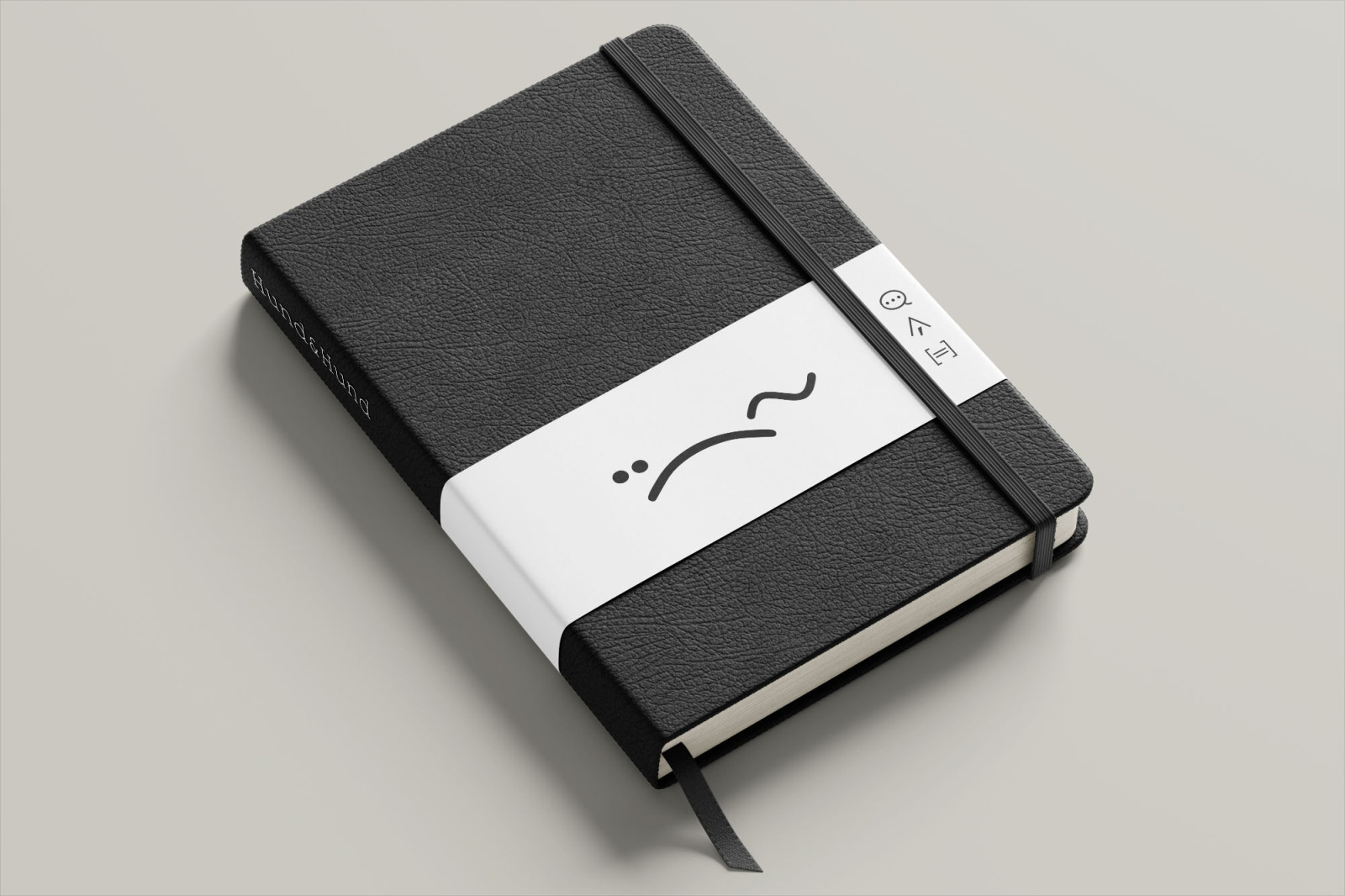 Hund and Hund logo on band around hardback notebook by BusbyWebb
